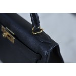 Kelly 28 black gold buckle with extreme pink French sheepskin inside